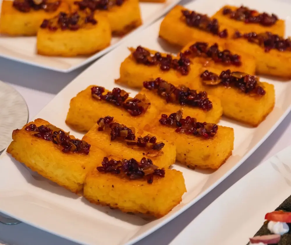 Modern tahchin squares topped with barberries